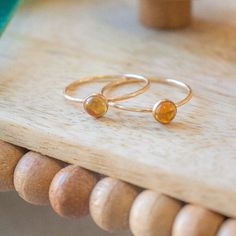 Radiate warmth and positivity with our stunning citrine ring. Crafted to capture the golden hues of the sun, this ring showcases the vibrant beauty of citrine gemstones. Perfect for adding a touch of brightness to your ensemble, or as a symbol of joy and abundance in your life. Don't know your ring size? Ring Size Guide or Buy Ring Sizer …………………………………. Details: Stone Citrine measuring 5mm Available in 14k Gold Filled or Sterling Silver Waterproof and can be worn everyday Size Inclusive and made Gold Citrine Birthstone Promise Ring, Gold Citrine Birthstone Ring For Promise, Everyday Round Citrine Jewelry, Everyday Citrine Jewelry, Yellow Citrine Birthstone Ring, Orange Citrine Birthstone Rings, Gold Citrine Gemstone Birthstone Ring, Gold Citrine Birthstone Ring With Gemstone, Orange Citrine Jewelry For Promise Ring