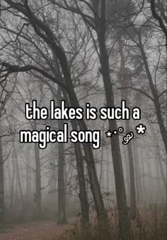 trees and fog with the words, the lakes is such a magic song