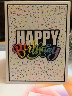 a happy birthday card with confetti and sprinkles