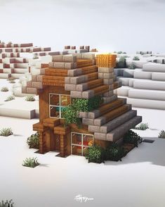 a house made out of blocks in the snow