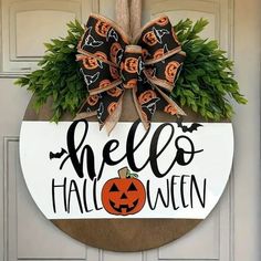 a door hanger that says hello halloween