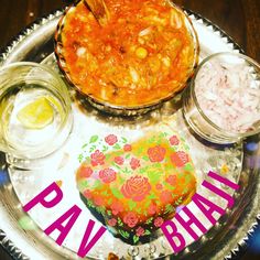 a plate with some food on it that says pav bhajbala