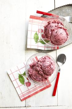 two bowls filled with ice cream on top of a table