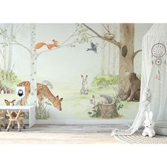 a child's room with woodland animals and trees