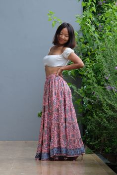 "This beautiful Skirts with  made from lightweight cotton fabric. which perfectly fit to your festival, beach, summer vacation or just new addition to your wardrobe that will inspire you for your new street look! This Skirts is comfortable and relaxation for any occasion.      🪡🧵 MATERIAL : cotton breathable muslin This skirts will fit sizes Small to Large, approximately Sizes 0-12 ( Not - XL ) * Waist : 24'' Stretching to 50'' ( 61 cm - 127 cm ) * Hips : up to 54\" ( 137 cm ) * Length : 40\" from waist to hem ( 101.6 cm ) * Lining in the same material and colour (cotton gauze) Length : 30\" Model is 5' 1\" and 103 lbs.  * Accessories excluded COLOR VARIATIONS Our clothes are hand-dyed in batches after they are sewn. ( The colour may different about 5-10 % from the real colour ) We aim f Ruffled Skirt Bottoms For Festival, Ruffled Mini Skirt For Festival, Festival Ruffled Skirt Bottoms, Non-stretch Long Pink Skirt, Festival Ruffled Mini Skirt, Festival Mini Ruffled Skirt, Non-stretch Ruffled Maxi Skirt, Flowy Maxi Skirt For Vacation, Non-stretch Long Ruffled Skirt