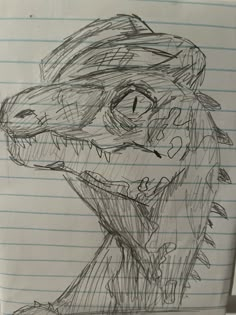 a drawing of a dinosaur on lined paper