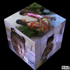 a cube with two images of people on the top and bottom, in front of a black background