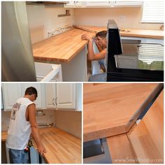 a man standing in front of a stove top oven next to a wooden countertop