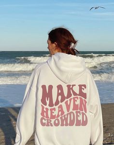 "Make Heaven Crowded, Graphic Sweater, sweatshirt, custom sweatshirt, Christmas Gift, christmas sweatshirt, Gift for her trendy sweatshirt *Double-Sided (See photos) Thanks for choosing my shop! This is a pre-shrunk, classic fit hoodie made with air-jet spun yarn for a soft feel. The brand is Gildan. If you would like the oversized look that the model is wearing please choose a size 1-3 times larger than your normal size. HOW TO ORDER 1. Choose your color of hoodie  2. Choose a size 3. Click \"A White Letter Print Sweatshirt For Winter, Winter White Letter Print Sweatshirt, White Fleece Sweatshirt With Letter Print, White Hoodie Sweatshirt With Letter Print, White Fleece Hoodie With Graphic Print, White Hoodie With Text Print Relaxed Fit, White Hoodie With Text Print In Relaxed Fit, White Relaxed Fit Hoodie With Text Print, White Slogan Crew Neck Hoodie