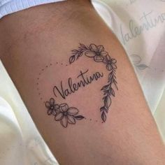 a tattoo with the word valentine written in it