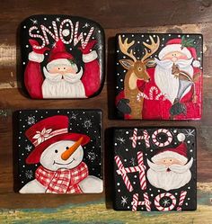 three christmas coasters with santa and snowmen on them, one is painted red