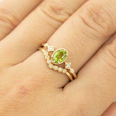 * ≈6x4mm oval peridot * Band width: ≈1.3mm * G color SI diamonds, ≈0.04ctw * Setting style: Prong setting, low profile (sits flush on your finger) * Material: Solid 14k yellow gold, rose gold or white gold * Made of 100% recycled precious metal and ethically sourced gemstone * Comes in a gift box with a bow ready for gifting * Handmade with love and great care in New York * Please note that colors may vary slightly as they are genuine gemstones. Our Dedication All our jewelry is designed and cre Peridot Birthstone Ring, July Birthstone Ring, Paper Ring, Peridot Jewelry, July Birthday, Vintage Diamond Rings, Mothers Necklace, Peridot Ring, Ring Oval