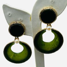 These Gorgeous Vintage Earrings From Swoboda Feature A Large Disk Of Genuine Jade On The Clip And A Huge Crescent Shaped Dangle Of Matching Jade On The Drop, Accented With A 6mm Genuine Cultured Pearl. The Earrings Are Framed In Gold Plated "Braided" Metal. The Earrings Are Quite Large For Swoboda, Usually Their Earrings Are Small And Dainty. The Top Jade Disk Is 3/4" Across And The Bottom Disk Is Just A Hair Under 1 1/2". The Earrings Drop A Total Length Of 2 1/2" And The Clips Are Nice And Secure. There Are A Few Tiny Fleabites On The Inside Edge Of One Crescent Disk, Barely Noticeable But Mentioned For Accuracy. The Earrings Are Signed Swoboda On The Back Of Each Clip. Green Dangle Chandelier Earrings, Green Metal Chandelier Earrings, Elegant Green Hoop Earrings For Formal Occasions, Elegant Green Drop Earrings, Elegant Green Hoop Earrings For Wedding, Green Metal Evening Earrings, Green Metal Earrings For Evening, Green Round Danglers For Party, Green Jewelry For Evening