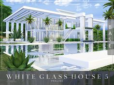 the white glass house is surrounded by greenery and palm trees in front of a pool