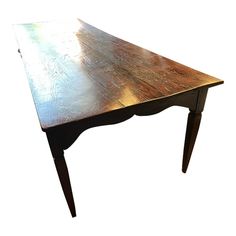 an old wooden table is shown against a white background