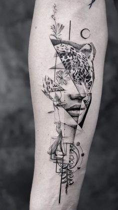 a woman's leg with an abstract tattoo design on the side of her thigh