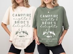 two women standing next to each other wearing t - shirts that say campfire and night's bride's delight