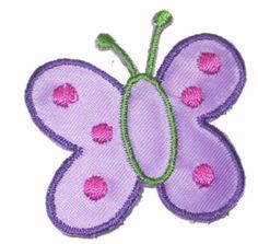 a purple butterfly with pink spots on it's wings