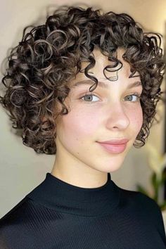 If you’re looking for a timeless style, the classic short perm with tight curls is your go-to. This hairstyle brings out the best in short hair, offering a lively and youthful look. Click here to check out more best perm hairstyles for natural looking curly hair. Very Curly Short Hairstyles, Perm Short Hair Girl, Permanent Curls Short, Curly Perm Short, Short Hair Perm Women, Perms For Short Hair Loose, Tight Curls Short Hair, Tight Curl Perm, Short Perms