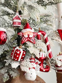 a christmas tree decorated with red and white ornaments