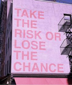 an advertisement on the side of a building that says take the risk or lose the chance