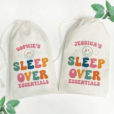 two bags with the words sleep over essentials printed on them next to a plant