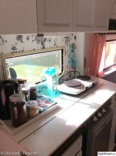 the kitchen counter is clean and ready to be used for cooking, or as an appliance