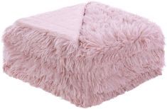 a fluffy pink blanket on top of a white floor