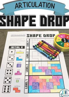 an articulation shape drop game with colored crayons and pencils on top