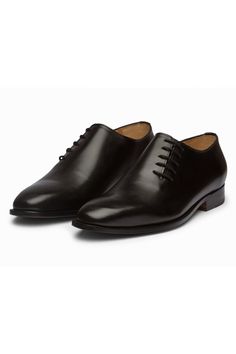 Black oxford shoes in leather base with hand built Argentinean leather sole, black calfskin leather uppers, rich tan leather lining and lace details.

Composition:Full Grain Calf Leather Uppers
Color:Black
Heel Height (inch): 1
Weight (kgs): 1
Closure: Tie up front - Aza Fashions Masculine Cap Toe Oxfords With Leather Sole, Cap Toe Oxfords With Leather Sole, Leather Oxford Shoes With Rubber Sole For Derby, Leather Oxford Shoes With Almond Toe For Derby, Leather Oxford Shoes With Rubber Sole For Formal Wear, Formal Leather Oxfords With Rubber Sole, Formal Leather Oxford With Rubber Sole, Business Oxfords With Rubber Sole, Elegant Plain Toe Oxfords In Bridle Leather