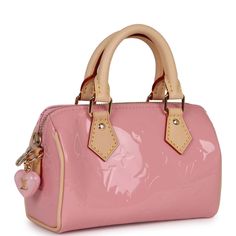 This Limited Edition Nano Speedy is in Mochi Pink Vernis with gold hardware, tonal stitching, vachetta trim, handles, and strap.The interior is lined in pink fabric.Origin: FranceCondition: New and never Accompanied by: Louis Vuitton box, Louis Vuitton dustbag, strap, materials card, carebookMeasurements: 6.5" width x 4" height x 3.25" depth; 2.25 handle drop 37" shoulder strap drop Louis Vuitton Nano Speedy, Nano Speedy, Louis Vuitton Box, Louis Vuitton Pink, Pretty Bags, Hermes Bags, Pink Fabric, Mochi, Handbag Backpack