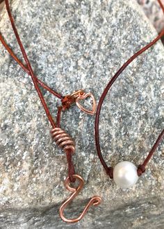 Minimalist Pearl and Leather Necklace Elegant Adjustable Copper Necklace, Handmade Adjustable Minimalist Pearl Necklace, Adjustable Hand Forged Brown Necklace, Cord Ends, A Necklace, Down To Earth, The Grace, Leather Chain, Leather Necklace