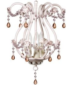 a white chandelier with pink beads hanging from it