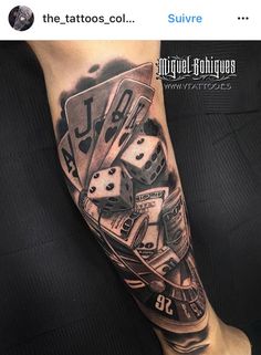 a man's leg with some dice and gambling cards on it