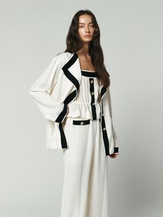 Composition : Shell: Polyester 100%Color : Light BeigeCountry of Origin : KOREA Chic Cream Long Sleeve Blazer, White Sporty Outerwear With Contrast Panels, Luxury Sporty Outerwear With Contrast Stripes, Luxury Outerwear With Contrast Stripes, Black Long-sleeve Outerwear With Contrast Color, Luxury Long-sleeve Outerwear With Contrast Trim, Jackets & Coats, Blazer