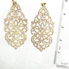 Super Glamorous Statement Makers! Elegant Metal Clip-on Earrings For Party, Elegant Metal Crystal Earrings For Party, Glamorous Pierced Crystal Earrings For Party, Glamorous Pierced Crystal Party Earrings, Chic Gold Earrings With Bling, Chic Gold Bling Earrings, Chic Gold Crystal Earrings For Evening, Elegant Metal Chandelier Earrings For Parties, Chic Sparkling Gold Earrings