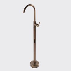 a brass colored bathroom sink faucet with an adjustable spout