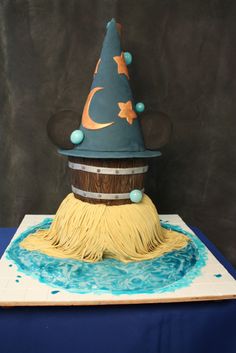 a cake that is shaped like a wizard's hat