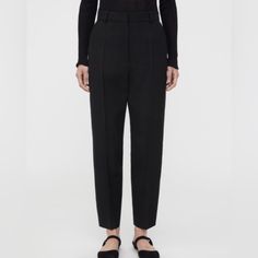 Toteme - Nwt Tapered Suit Trousers, High Waisted, Black Chic Modern Timeless Classic Black Trouser. Beautiful Woven Fabric. 85% Viscose, 15% Linen Side Slit Pockets, Two Back Welt Pockets Size 38: Waist 15.5 Inches - 40 Cm. Inseam 25.75 Inches - 66 Cm. Rise 14.5 Inches - 36 Cm Chic. Classic. Elegant. Timeless. Black. Linen. Scandinavian. Swedish. Tailored. High Waist. Tapered. Trousers. Suit. Dressy. Luxury. Textile. Woven. Viscose. Toteme. High End. Special Occasion. Smart Casual. Black. Design Trousers High Waisted, Suit Trousers, Tapered Trousers, European Designs, Classic Elegant, Casual Black, Trouser Suits, Black Linen, Black Design