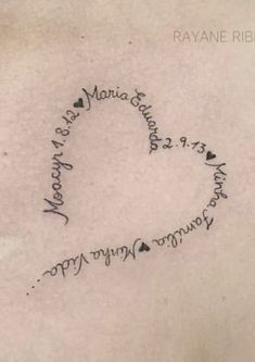 the back of a woman's stomach with writing on it