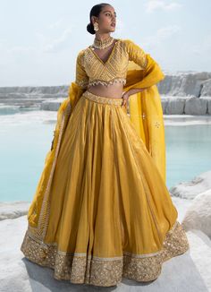 Luxury Yellow Georgette Blouse Piece, Luxury Yellow Georgette Lehenga, Luxury Orange Chanderi Lehenga, Luxury Yellow Lehenga With Cutdana, Luxury Yellow Tussar Silk Lehenga, Luxury Yellow Anarkali Blouse Piece, Luxury Yellow Chanderi Blouse, Luxury Yellow Lehenga In Silk Blend, Luxury Yellow Raw Silk Choli