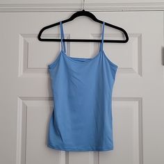 Great Basic To Own Perfect For On The Go Great For Any Wardrobe Good Condition Cute For The Warm Weather Great Color To Own Built In Bra Adjustable Straps Brand New And Never Worn Feel Free To Send Any Reasonable Offers Tank Top Cami, Cami Tanks, White Tops, Black And Tan, White House Black, White House Black Market, House Black, Black House, Warm Weather