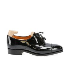 WOMEN'S OXFORDS IN BLACK PATENT LEATHER Black Cap Toe Lace-up Shoes For Office, Black Brogue Oxfords For Galas, Black Lace-up Oxfords With Leather Sole, Black Luxury Oxfords With Rubber Heel Cap, Luxury Black Oxfords With Rubber Heel Cap, Black Cap Toe Loafers With Rubber Sole, Black Lace-up Oxfords With Leather Lining, Black Cap Toe Dress Shoes For Galas, Black Cap Toe Loafers For Galas