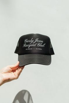 Complete your outfits with ease with the Script Trucker Hat! The classic black color looks great with any color and is the perfect accessory for any outfit, and the beautiful script graphic will add a stylish flair to any outfit. The Club Collection DETAILS Mesh Back Adjustable Strap 24.75" Circumference at the last adjustment 11" Long MATERIAL + CARE 100% Polyester Import Trendy Hats, Streetwear Hats, Hat Art, Black Snapback, Hat Ideas, Capsule Outfits, Dope Fashion, The Script, Maternity Shops