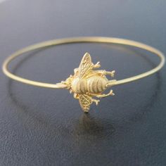 Save the Bees Bumble Bee Bracelet – FrostedWillow Bumble Bee Jewelry, Bee Bracelet, Spring Bracelet, Bee Jewelry, The Bangles, Gold Armband, Spring Jewelry, Bee Charms, Best Jewelry Stores