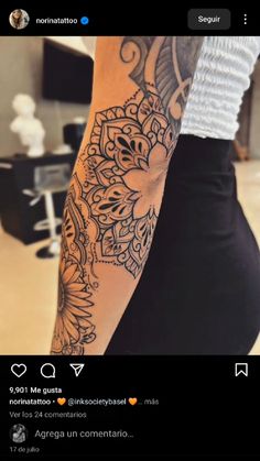 a woman's arm with tattoos on it and an instagramt to her