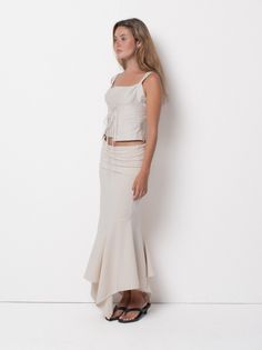 The Mae skirt is a full-length skirt featuring a fold-over waist and flared bottom. Made from organic cotton lycra. Cream Gathered Flared Skirt, Beige Cotton Flared Maxi Skirt, Cream Tiered Gathered Maxi Skirt, White Flared Maxi Skirt With Gathered Detail, Beige Relaxed Flared Maxi Skirt, Balloon Skirt, Full Length Skirts, Full Length, Organic Cotton