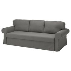 a gray couch sitting on top of a white floor