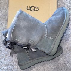 Authentic Ugg Boots In The Bailey Bow Ii Style In Grey. Worn Maybe Twice And Always Stored In The Box Which Is Taped Closed To Prevent Dust Collecting. They Are Basically Brand New. Women’s Size 8 Ugg Grey, Ugg Boot, Shoes Ugg, Bailey Bow, Womens Uggs, Ugg Shoes, Ugg Boots, Slippers, Women Shoes