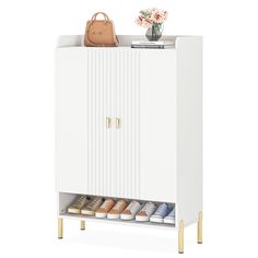 This spacious and adjustable 6-tier shoe cabinet can hold up to 20 pairs of shoes, accommodating various sizes and providing a clutter-free storage solution for your entryway or bedroom.. This slim shoe storage cabinet features concealed storage doors and a spacious tabletop, making it an essential and stylish furniture piece for any home with multiple storage needs.. This shoe organizer's white and gold design enhances the visual appeal of any home decor, adding a fashionable and functional element to your living space.. Tribesigns Adjustable 6-Tier Shoe Cabinet with Concealed Storage Doors, White/Gold, Holds up to 20 Pairs, Freestanding Shoe Organizer | HOGA-F1724 Slim Shoe Storage, Storage Doors, Concealed Storage, Closet Accessories, Cabinet Features, Shoe Storage Cabinet, Shoe Organizer, Hold Ups, White Home Decor